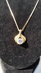 lot 38 image: 14K Plum Yellow Gold Pendant on a 14K Chain Necklace  9 grams