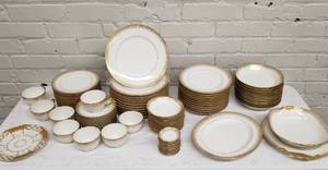 lot 27 image: Antique Service of Delinieres and Co France Gold & White China