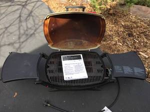 lot 125 image: Portable Weber Propane Grill