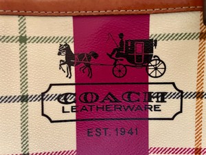 lot 111 image: Bright and Beautiful Coach Purse