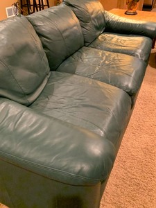 lot 77 image: Emerson Green Leather Sofa