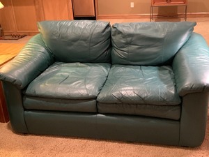 lot 78 image: Emerson Green Leather Loveseat