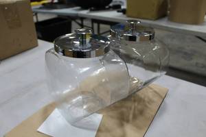 lot 529 image: Lot of (2) Anchor Hocking Glass Penny CandyCookie Jar with Stainless Steel Lid 8Wx5Dx9H (in 1 box)