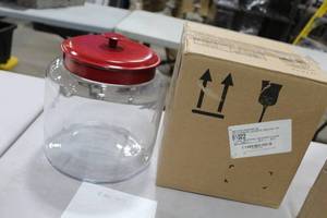 lot 534 image: Lot of (2) Anchor Hocking Glass Montana Jar with Red Lid 1-12 Gallon 9Dx 9-12H (in 2 boxes)