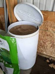 lot 99 image: Huge Bucket Filled with Grass Seed