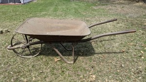 lot 32 image: Rusty Metal Wheelbarrow