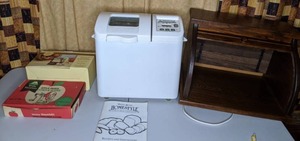 lot 259 image: Bread Box, Bread Machine, & Apple Corers and Slicers (2)