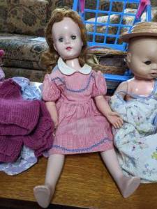lot 153 image: Two Dolls w Shopping Cart, Clothing & Quilts