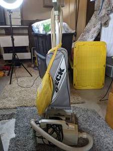 lot 333 image: Two Vacuums Upright and Canister