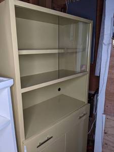 lot 423 image: Tall Metal Cabinet w Sliding Glass Door