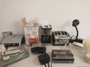 Collection Of Kitchen Appliances And Other Electronics