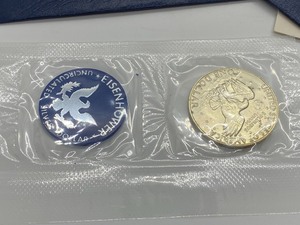 Two 1974 Uncirculated Eisenhower Silver Dollars