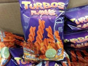 lot 139 image: Case of 64 Bags Turbo Flamas Snacks...