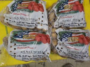 lot 167 image: 4 -5 lb. Bags Potatoes...