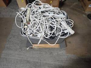 lot 60 image: Large bin full of mixed power strips, most are STAPLES&nbsp6in Power Strip FS-066