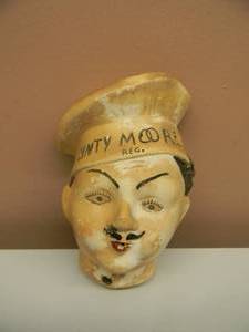lot 38 image: RARE - VINTAGE CHALKWARE DINTY MOORE CHEF HEAD STRING HOLDER - RARE AWESOME PIECE - APPROX 8 BY 6 - SEE PICTURES