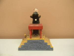 lot 44 image: VINTAGE CAST IRON MECHANICAL BANKS MAGICIAN - VERY COOL PIECE - NICE - SEE PICTURES