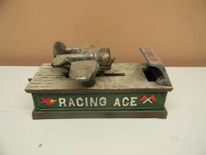 lot 45 image: VINTAGE CAST IRON MECHANICAL BANKS RACING ACE - VERY COOL PIECE - NICE - SEE PICTURES