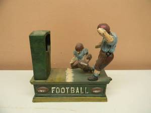 lot 46 image: VINTAGE CAST IRON MECHANICAL BANKS FOOTBALL - VERY COOL PIECE - NICE - SEE PICTURES