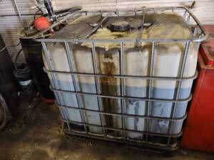 lot 52 image: Waste Oil Tote with Oil...