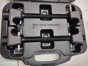 lot 113 image: Powerbuilt Strut Spring Compressor...
