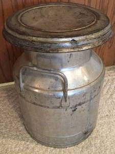 lot 217 image: Decorative Metal Milk Can