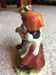 lot 239 image: Arnart 5Th Avenue Hand Painted Boy and Girl Figure