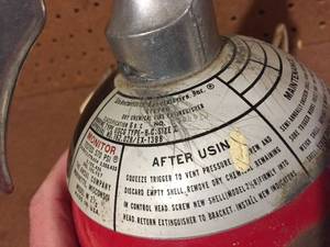 lot 352 image: Vintage Round Ansul Fire Extinguisher and Wall Mount