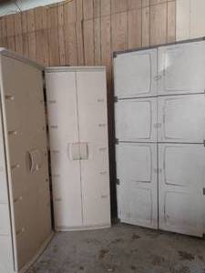 Three Rubbermaid Storage Containers