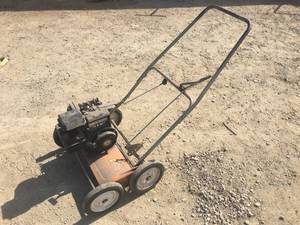 lot 26 image: 5HP Motorized Lawn Rake