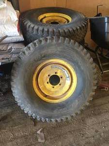 lot 34 image: Lot of 4 Skid Loader WheelsTires