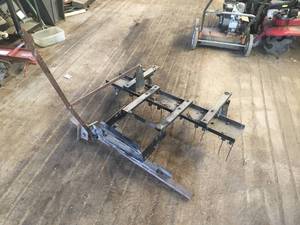 lot 43 image: Zero Turn Thatcher Attachment