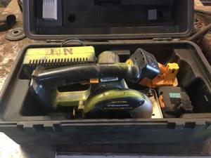 lot 52 image: Panasonic EY3530 15.6 Volt Metal Cutter with Charger and Four Batteries