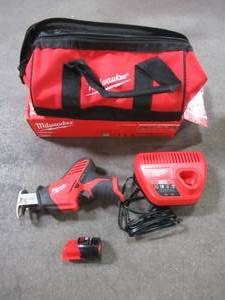 lot 19 image: Milwaukee M12 12-Volt Lithium-Ion Cordless HACKZALL Reciprocating Saw Kit, 2420-21. Used. With Bag, Battery and Charger.