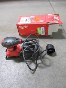 lot 23 image: Milwaukee 3 Amp 14 Sheet Corded Palm Sander 6033-21, Used.
