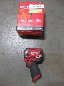 lot 24 image: Milwaukee M12 FUEL 12-Volt Lithium-Ion Brushless Cordless Stubby 38 in. Impact Wrench (Tool-Only), 2554-20. Used.
