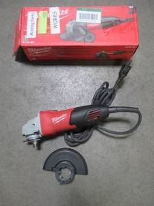 lot 27 image: Milwaukee 7 Amp Corded 4-12 in. Small Angle Grinder, 6130-3, Used. Missing Handle.