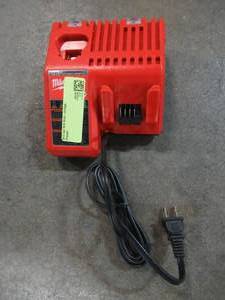 lot 41 image: Milwaukee M12 and M18 Multi-Voltage Charger, 48-59-18112. Used.