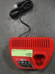 lot 43 image: Milwaukee M12 12-Volt Lithium-Ion Battery Charger, 48-59-2401. Used.