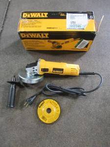 lot 53 image: Dewalt 7 Amp 4-12 in. Small Angle Grinder with 1-Touch Guard, DWE4011 - Used. Missing Nut.