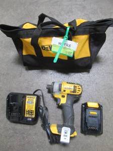 lot 67 image: Dewalt ATOMIC 20-Volt MAX Cordless Brushless Compact 14 in. Impact Driver, (1) 20-Volt 1.3Ah Battery, Charger & Bag, DCF809C1 - Used.