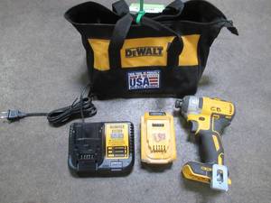 lot 68 image: Dewalt 20-Volt MAX XR Cordless Brushless 3-Speed 14 in. Impact Driver with (1) 20-Volt 5.0Ah Battery & Charger, DCF887P1 - Used.