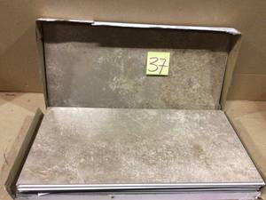 Matsu Islands Travertine 12.20 in. W x 24.41 in. L Vinyl Tile (20.69 sq. ft.) by Lifeproof Customer Returns See Pictures Customer Returns See Pictures&nbsp