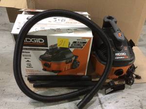 lot 21 image: 4 Gal. 5.0-Peak HP Portable WetDry Shop Vacuum with Filter, Hose, Accessories and Premium Car Cleaning Kit by RIDGID Customer Returns See Pictures 