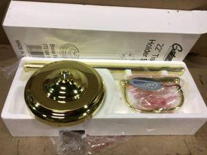 lot 31 image: Double Post Toilet Paper Holder in Polished Brass by Gatco Customer Returns See Pictures 