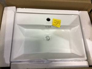 lot 35 image: Claire 24 in. Console Sink White Basin Black Legs by Swiss Madison Customer Returns See Pictures 