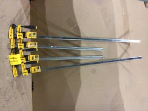 lot 44 image: 24 in. 600 lb. Bar Clamp w2.5 in. Throat Depth by DEWALT Customer Returns See Pictures 