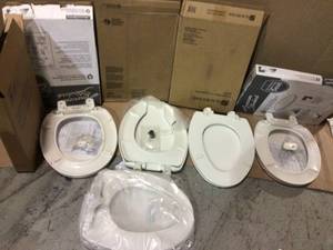 lot 70 image: Cadet Slow Close EverClean Round Slow Close Toilet Seat in White by American Standard Customer Returns See Pictures 
