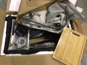 lot 9 image: All-in-One Undermount Stainless Steel 32 in. Single Bowl Kitchen Workstation Sink with Faucet and Accessories Kit by Glacier Bay Customer Returns See Pictures