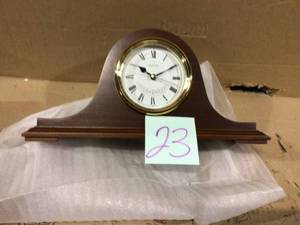 lot 23 image: Bent Wood Case with Walnut Mantel Chime Clock by Bulova Customer Returns See Pictures
